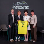 Trinity Rodman of the United States re-signs with her club team, the Washington Spirit, alongside club owner Michele Kang and president of soccer operations Haley Carter during a press conference at BMO Stadium on January 22, 2026 in Los Angeles , California.