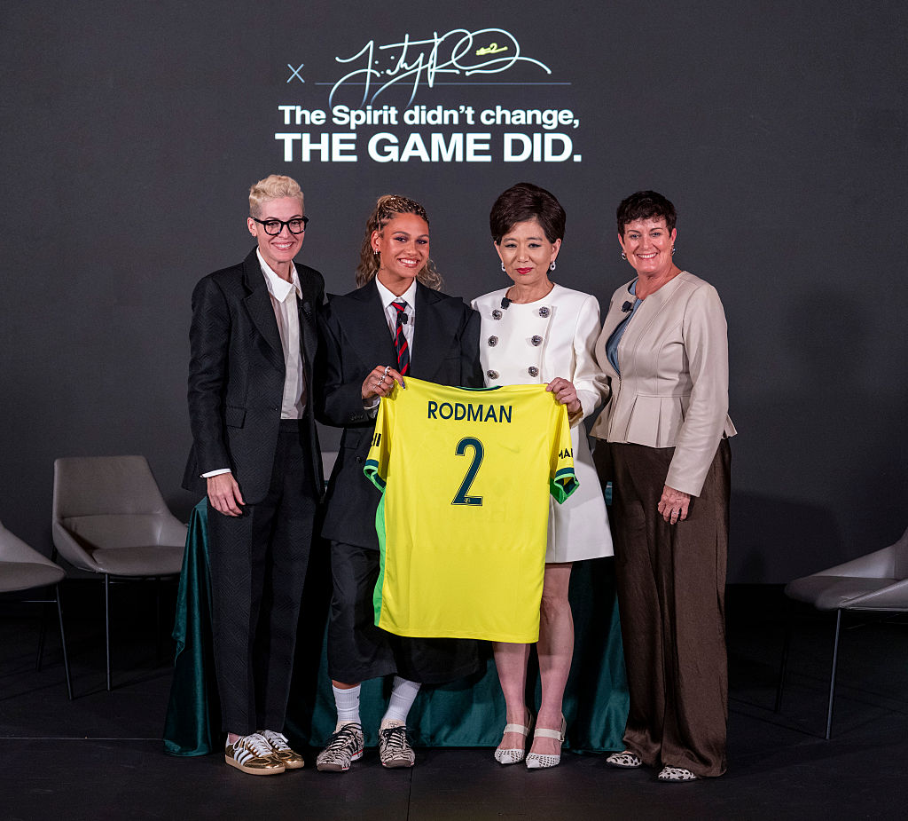 Trinity Rodman of the United States re-signs with her club team, the Washington Spirit, alongside club owner Michele Kang and president of soccer operations Haley Carter during a press conference at BMO Stadium on January 22, 2026 in Los Angeles , California.