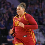 Audi Crooks #55 of the Iowa State Cyclones runs down court after scoring a basket against the Iowa State Cyclones in the second half at Bramlage Coliseum.