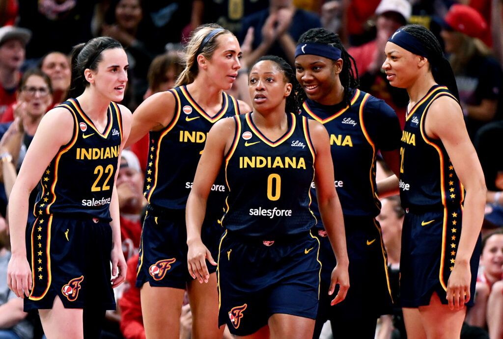 Caitlin Clark #22 of the Indiana Fever and Kelsey Mitchell #0 of the Indiana Fever react against the New York Liberty during the second half at Gainbridge Fieldhouse.