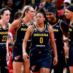Caitlin Clark #22 of the Indiana Fever and Kelsey Mitchell #0 of the Indiana Fever react against the New York Liberty during the second half at Gainbridge Fieldhouse.