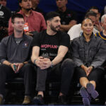 CHICAGO, ILLINOIS - AUGUST 23: Former basketball player Enes Kanter Freedom looks on courtside during the first half between the Chicago Sky and the Indiana Fever at Wintrust Arena on August 23, 2026 in Chicago, Illinois.