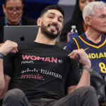 Former basketball player Enes Kanter Freedom looks on courtside prior to the game between the Chicago Sky and the Indiana Fever at Wintrust Arena.
