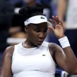 Venus Williams of the United States reacts to match point against Sofia Kenin of the United States during her Women's Singles First Round match on Day One of the 2026 US Open at USTA Billie Jean King National Tennis Center.