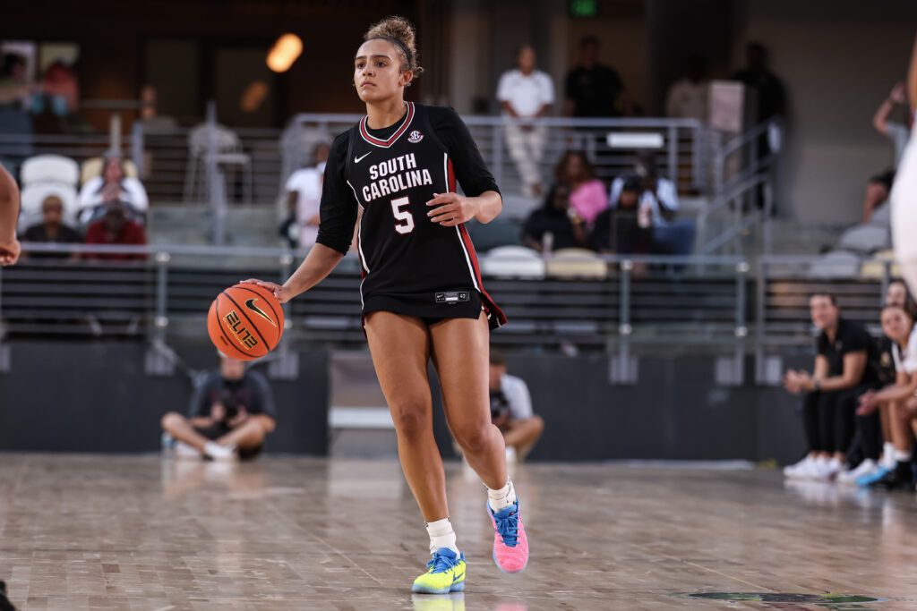 Tessa Johnson #5 of the South Carolina Gamecocks controls the ball during the second half of the 2026 LinkU Invitational against the College of Charleston Cougars at Credit One Stadium ahead of a UConn matchup.