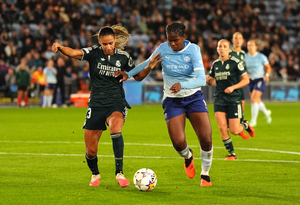Manchester City's Bunny Shaw (right) and Real Madrid's Maelle Lakrar battle for the ball during the UEFA Women's Champions League, league phase match at the Joie Stadium, Manchester.