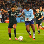 Manchester City's Bunny Shaw (right) and Real Madrid's Maelle Lakrar battle for the ball during the UEFA Women's Champions League, league phase match at the Joie Stadium, Manchester.