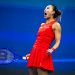 Qinwen Zheng of China reacts to defeating Marie Bouzkova of the Czech Republic in the third round on Day 6 of the China Open at National Tennis Center.