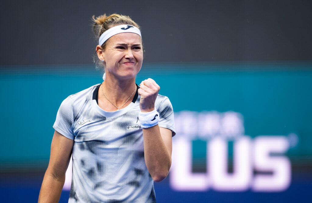 Marie Bouzkova of the Czech Republic in action against Qinwen Zheng of China in the third round on Day 6 of the China Open at National Tennis Center.