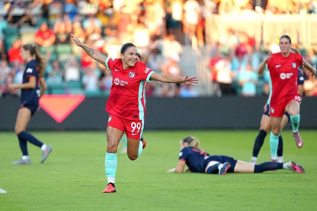 Debinha #99 of Kansas City Current celebrates scoring her team's second goal during the NWSL match between Kansas City Current and Bay FC.