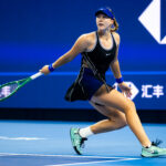 Mirra Andreeva in action against Ekaterina Alexandrova in the quarter-final on Day 9 of the China Open at National Tennis Center.