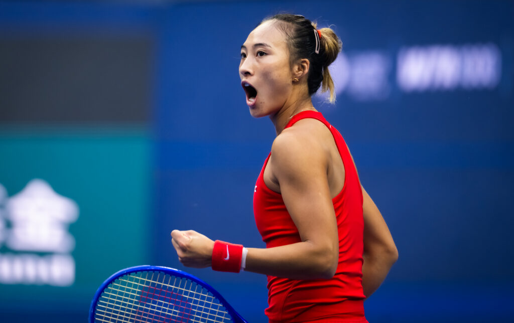 Qinwen Zheng of China in action against Elina Svitolina of Ukraine in the quarter-final on Day 10 of the China Open at National Tennis Center.