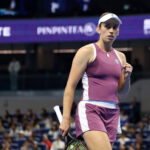 Elise Mertens of Belgium reacts during the Women's Singles quarterfinal match against Iga Swiatek of Poland on day ten of China Open at the National Tennis Center.