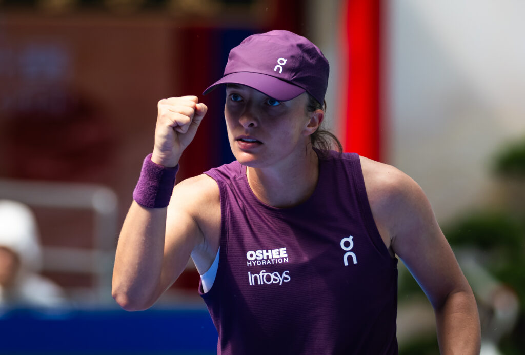Iga Swiatek of Poland in action against Magdalena Frech of Poland in the women's singles second round on Day 3 of the Dongfeng Voyah Wuhan Open.