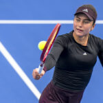 Iva Jovic of the United States in action against Maja Chwalinska of Poland in the third round on Day 4 of the Wuhan Open at Optics Valley International Tennis Center.