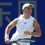 Sonay Kartal of Great Britain returns a shot in the Women's Singles Round of 64 match against Anhelina Kalinina of Ukraine on day 1 of Wuhan Open.