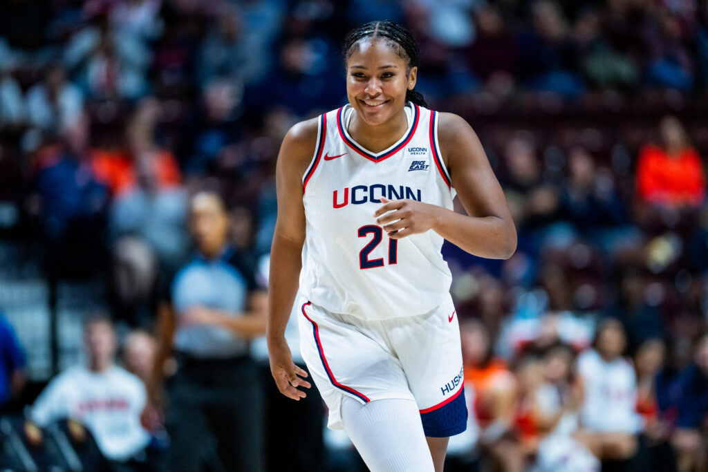 Sarah Strong #21 of the Connecticut Huskies plays against the Syracuse Orange during the second half of an NCAA women's exhibition basketball game at Mohegan Sun Arena.