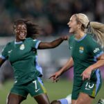 Midfielder Lindsey Heaps (10) and defender Ayo Oke (7) of the Denver Summit FC celebrate Heaps' goal during a game against Angel City FC on Saturday, Oct. 17, 2026, at Centennial Stadium in Centennial, Colo.