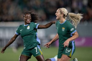 Midfielder Lindsey Heaps (10) and defender Ayo Oke (7) of the Denver Summit FC celebrate Heaps' goal during a game against Angel City FC on Saturday, Oct. 17, 2026, at Centennial Stadium in Centennial, Colo.