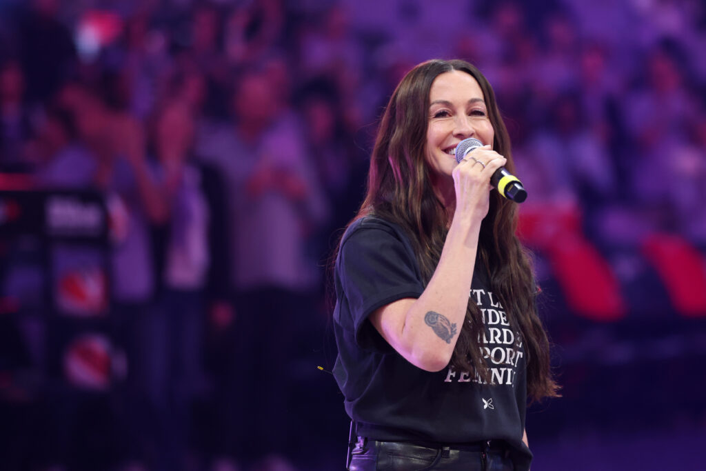 Alanis Morissette performs the national anthem before game two of the WNBA Finals between the Golden State Valkyries and the Atlanta Dream at Chase Center.