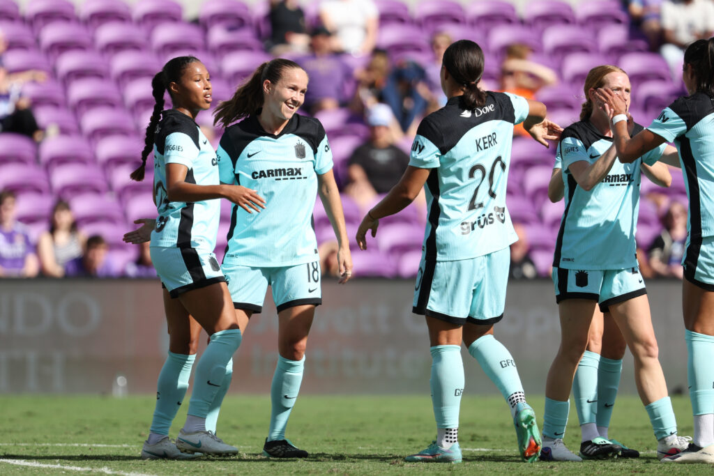 Midge Purce #23 of NJ/NY Gotham FC celebrates scoring her team's first goal with teammates during the NWSL match between Orlando Pride and NJ/NY Gotham FC at Inter.co Stadium.