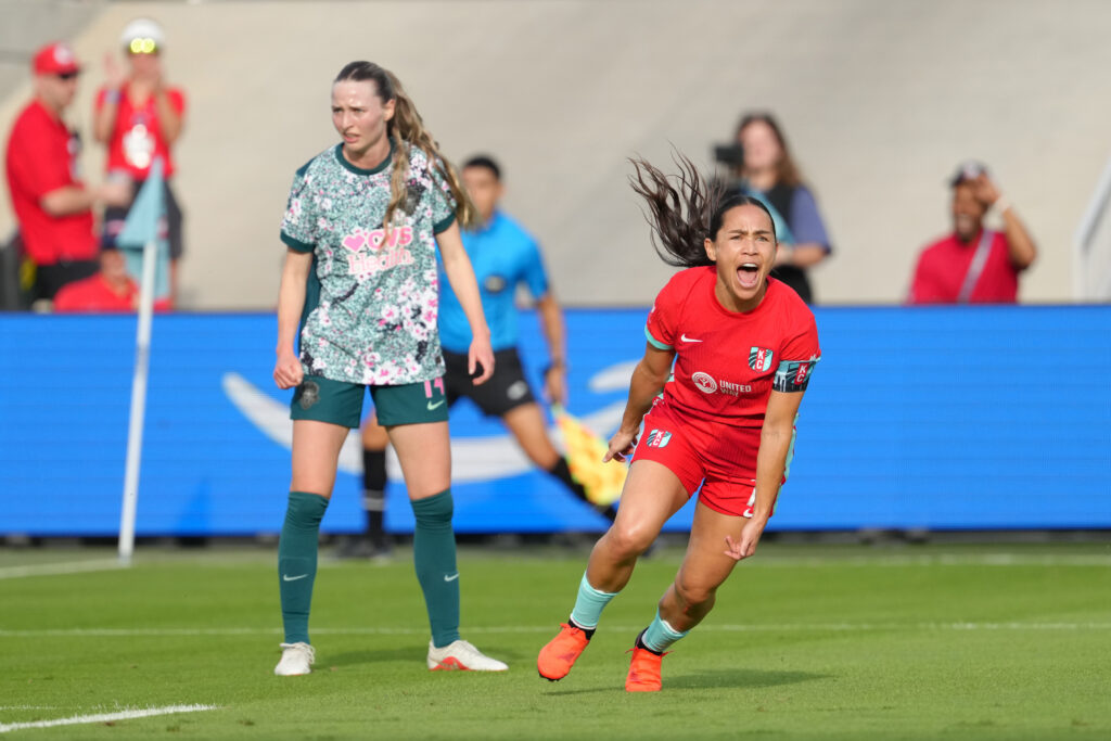 Lo'eau LaBonta #10 of Kansas City Current celebrates scoring her team's first goal during the NWSL match between Kansas City Current and Washington Spirit at CPKC Stadium.