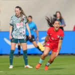 Lo'eau LaBonta #10 of Kansas City Current celebrates scoring her team's first goal during the NWSL match between Kansas City Current and Washington Spirit at CPKC Stadium.