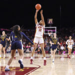 Juju Watkins #12 of the USC Trojans shoots the ball against Lulu Twidale #10 of the California Golden Bears during the fourth quarter of an exhibition game at Galen Center on October 25, 2026 in Los Angeles, California.