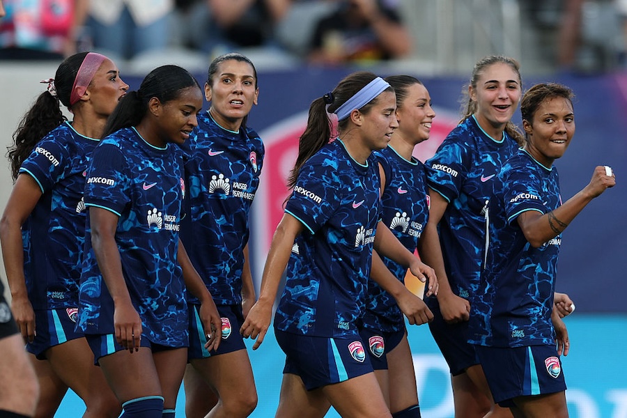 Gia Corley #11 of San Diego Wave FC celebrates with teammates after scoring the first goal of the team during the NWSL match between San Diego Wave FC and Boston Legacy FC.