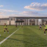 Exterior rendering of Columbus NWSL's OhioHealth Training Grounds with soccer players practicing on a grass field.
