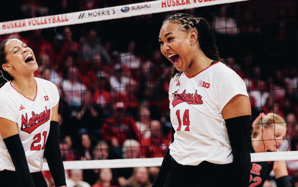 Nebraska Huskers celebrate their latest NCAA volleyball win.