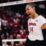 Nebraska Huskers celebrate their latest NCAA volleyball win.